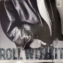 Steve Winwood - Roll With It